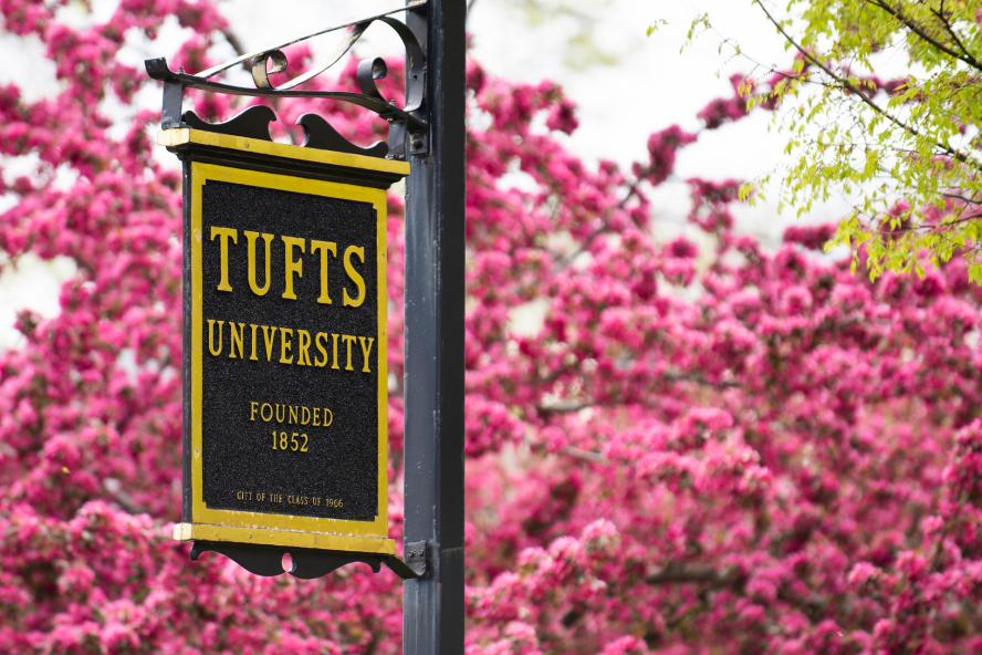 Tufts sign with pink flowers